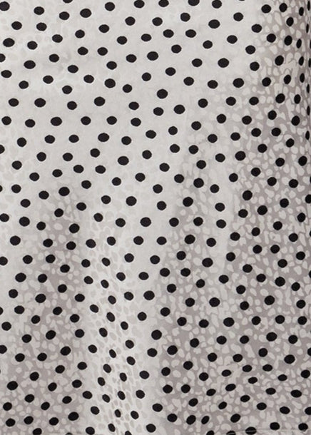 Stretch Polka Dot Fabric imposed over Animal Print